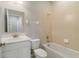 Cozy bathroom featuring a single vanity, toilet, and a combined shower and bathtub at 4220 Via Piedra Cir # 4-101, Sarasota, FL 34233