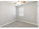 This bedroom features neutral walls, plush carpeting, and a ceiling fan for added comfort at 4220 Via Piedra Cir # 4-101, Sarasota, FL 34233