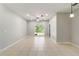 Expansive living room with recessed lighting, a ceiling fan, and neutral paint at 4220 Via Piedra Cir # 4-101, Sarasota, FL 34233
