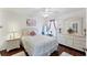 Bright bedroom with hardwood floors, ceiling fan and stylish decor at 4585 Dover Street E Cir, Bradenton, FL 34203