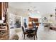 Cozy breakfast nook with a glass table, seating for four, and views to the backyard patio at 4585 Dover Street E Cir, Bradenton, FL 34203