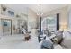 Spacious living room with tile floors, neutral tones, and plenty of natural light from a large window at 4585 Dover Street E Cir, Bradenton, FL 34203