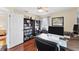 Spacious home office with hardwood floors and built in book shelves at 4585 Dover Street E Cir, Bradenton, FL 34203
