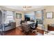Home office with built-in desk, hardwood floors, and stylish decor at 4585 Dover Street E Cir, Bradenton, FL 34203
