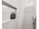 Sleek shower displays gray tiles and recessed shelving at 5365 Craig Ter, Port Charlotte, FL 33981