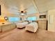 Cozy bedroom featuring two twin beds, ceiling fan, and matching dressers at 5511 Denmark Dr, Bradenton, FL 34207