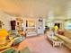 Spacious living room offering plenty of seating options and a seamless transition to other living spaces at 5511 Denmark Dr, Bradenton, FL 34207