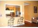 Kitchenette area features a breakfast bar, stainless steel appliances, and a pass-through to the rec area at 5681 Bidwell Pkwy # 104, Sarasota, FL 34233