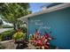 A community sign for Braden River Lakes, complemented by colorful plants at 613 E 49Th E St, Bradenton, FL 34208