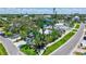 Inviting coastal home featuring mature tropical landscaping, well-maintained lawns, and neighborhood views at 643 Calle Del Otono, Sarasota, FL 34242