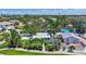 Charming single-story home landscaped with palm trees and a cozy outdoor patio area at 643 Calle Del Otono, Sarasota, FL 34242