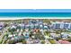 Lovely aerial view of a neighborhood coastal home, situated near immaculate beaches and calm, clear ocean waters at 643 Calle Del Otono, Sarasota, FL 34242