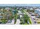 Charming coastal home featuring mature tropical landscaping, well-maintained lawns, and neighborhood views at 643 Calle Del Otono, Sarasota, FL 34242