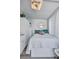 Small bedroom with a full bed, white shiplap walls, a ceiling fan, and sheer curtains at 643 Calle Del Otono, Sarasota, FL 34242