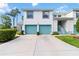 Inviting two-story condo with attached garage and a well-manicured lawn at 6572 Fairway Gardens Dr # 6572, Bradenton, FL 34203