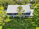 Charming two-story condo featuring a screened-in lanai and lush landscaping at 6572 Fairway Gardens Dr # 6572, Bradenton, FL 34203