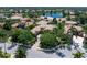 Aerial view of tile roof home showcasing lush landscaping and waterfront neighborhood at 6808 Belmont Ct, Lakewood Ranch, FL 34202