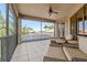 Relaxing screened-in balcony with outdoor seating and beautiful views at 6808 Belmont Ct, Lakewood Ranch, FL 34202