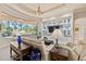 Elegant living room with cozy seating and lanai view at 6808 Belmont Ct, Lakewood Ranch, FL 34202