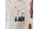 Welcoming entryway leading to a brightly lit living room with tile floors at 6808 Belmont Ct, Lakewood Ranch, FL 34202