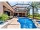 Backyard pool with fountains and spa offers relaxing waterfront scenery and patio seating at 6808 Belmont Ct, Lakewood Ranch, FL 34202
