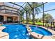 Backyard pool with fountains and spa offers relaxing waterfront scenery and patio seating at 6808 Belmont Ct, Lakewood Ranch, FL 34202