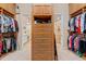 Spacious walk-in closet with custom built-in shelving and ample storage space at 6808 Belmont Ct, Lakewood Ranch, FL 34202