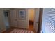 Bedroom with an en suite bathroom and closet spaces at 7004 Mauna Loa Blvd, Sarasota, FL 34241