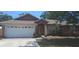 Charming single-story home featuring a two-car garage and a well-maintained front lawn at 7004 Mauna Loa Blvd, Sarasota, FL 34241