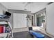 Exercise room features fitness equipment, closet, and sliding glass doors for natural light at 7205 Pointe West Blvd, Bradenton, FL 34209
