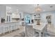 Kitchen and dining area featuring stainless appliances and access to the backyard swimming pool at 7205 Pointe West Blvd, Bradenton, FL 34209