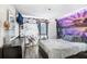 A unique bedroom with an artistic flair and a cozy, relaxed atmosphere at 7321 Caladesia Dr, Sarasota, FL 34243