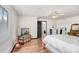 This spacious bedroom features wood floors, and a ceiling fan at 7321 Caladesia Dr, Sarasota, FL 34243