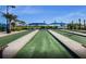 Well-maintained bocce ball courts offer a leisurely outdoor activity with shaded seating areas at 7327 Summerland Cv, Bradenton, FL 34202