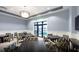 Comfortable dining area with table and chairs, illuminated by natural light, for a pleasant dining experience at 7327 Summerland Cv, Bradenton, FL 34202