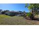 Well-maintained backyard with a screened-in lanai, perfect for outdoor relaxation and entertaining at 7524 Kavanda St, North Port, FL 34287