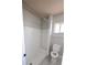 Clean bathroom featuring a walk-in shower, and tile flooring at 7524 Kavanda St, North Port, FL 34287