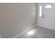 Clean foyer with tile flooring and a white front door at 7524 Kavanda St, North Port, FL 34287