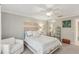 Bedroom with mirrored closet doors at 7632 Quinto Dr, Sarasota, FL 34238