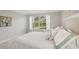 Bedroom with a view of the backyard at 7632 Quinto Dr, Sarasota, FL 34238