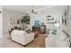 Well-lit living room showcasing neutral walls, modern decor, and a comfortable seating arrangement at 7632 Quinto Dr, Sarasota, FL 34238