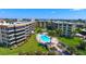 The community pool is the focal point of these condominiums at 8779 Midnight Pass Rd # 506H, Sarasota, FL 34242