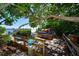Picturesque spot with kayaks and lush greenery offering access to waterfront activities and scenic views at 8779 Midnight Pass Rd # 506H, Sarasota, FL 34242