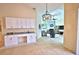 Open-concept living space featuring tiled floors and natural light at 950 Trotter St, Nokomis, FL 34275