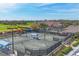 A beautiful aerial view of the tennis courts and the community clubhouse at 9630 Club South Cir # 6303, Sarasota, FL 34238
