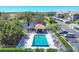 Aerial view of community pool with plenty of lounge chairs for relaxation at 9630 Club South Cir # 6303, Sarasota, FL 34238