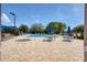 Community pool area, featuring a hot tub, lounge chairs, tables and umbrellas for relaxing by the pool at 9630 Club South Cir # 6303, Sarasota, FL 34238