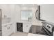 Stylish kitchen with stainless steel appliances, black dishwasher and a serving hatch at 9630 Club South Cir # 6303, Sarasota, FL 34238