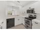 Well-equipped kitchen featuring stainless steel appliances, sleek countertops, and modern fixtures at 9630 Club South Cir # 6303, Sarasota, FL 34238