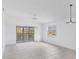 Spacious living room featuring tile floors, bright light and access to patio at 9630 Club South Cir # 6303, Sarasota, FL 34238